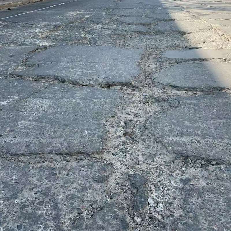 阳春路面起砂露石子修补料